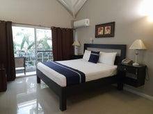 Load image into Gallery viewer, Premium Studio King Bed/Kitchen (29,980JMD)