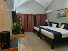 Load image into Gallery viewer, Premium Studio (Double Bed) ($27,980JMD)